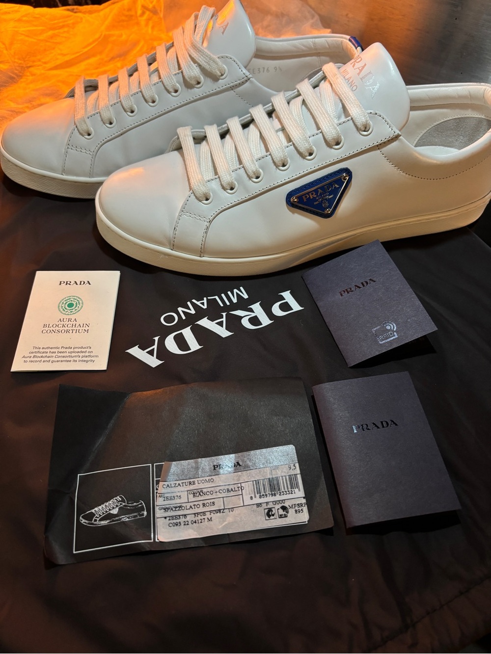 Prada White Leather Low-Top Sneakers with Blue Logo Plaque. Size 10.5 USA Men.
